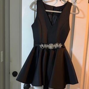 Elegant Black Dress with Embellished Belt